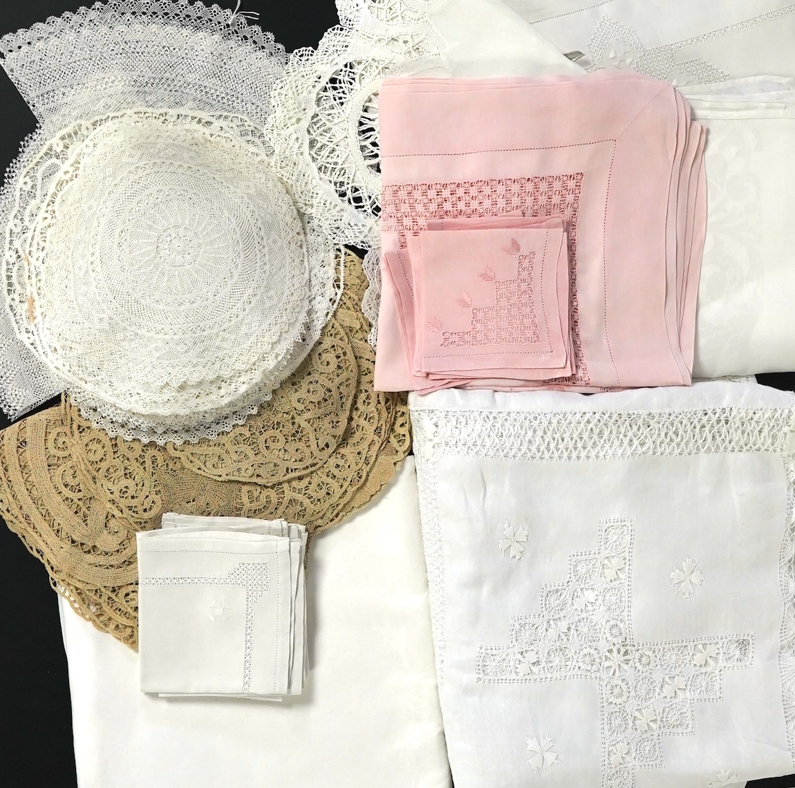 A large drawn thread worked table cloth, various other table cloths, napkins and various sets of fine hand made tatting and fine tape lace table mats